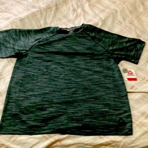 Reebok T-Shirt light and dark color green. The shirt is new never been worn..!!